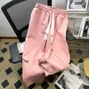 Jeans da uomo Donna Stile Preppy carino Pantaloni sportivi bianchi con coulisse Pantaloni larghi casual Hip Hop Uomini dritti College 230831