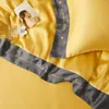 Zestawy pościeli 2023 Czteroczęściowe proste bawełniane podwójne łóżek z łóżka kołdra haftowany Twill Wygodny żółty kolor