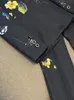 Conjunto de calças de duas peças com estampa floral preta outono 2023 manga comprida lapela entalhada blazers com botão único calças flare conjunto de ternos de duas peças O3G302692 plus size