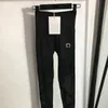 Pantaloni da yoga slim da donna con ricamo Leggings traspiranti a vita alta Pantaloni sportivi da palestra sportivi di marca di moda