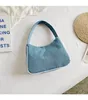 Märke 23SS Day Packs Fashion Underarm Bag Vintage Single Shoulder Bag Casual Handbag Crescent Bag