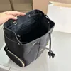 Borse da scuola in nylon di moda per ragazze adolescenti Borsa da libro di design da uomo Zaino di lusso da donna Borsa nera Zaino grande unisex