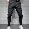 Pantaloni da uomo 2023 Pantaloni formali sottili Giacca sportiva da uomo Moda coreana Abito nero maschile Abito classico Bianco Harem A44