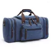 Duffelväskor Casual Men Canvas Travel Design Travel Duffle stor kapacitet handväska manlig affärshelgväska över natten stort bagage