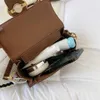 Bu yılki popüler ışık lüks yuvarlak kova omuz crossbody çantası ucuz outlet% 50 indirimli kadınlar için yüksek kaliteli niş tasarım el çantası