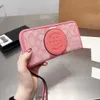 Nouveau Macaron Zipper Long Wallet Dragonne Téléphone Femmes Changement De Poche Usine En Ligne 70% vente