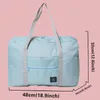 Duffel Väskor stor kapacitetsbrev reseväska hand bagage tote fällning för lady weekend arrangör kläder förvaring nylon kvinnors förpackningar
