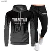 Tracksuit Trapstar Brand Jackets tryckta sportkläder Men t -skjortor 16 färger varma två stycken Set Loose Hoodie Sweatshirt Pants Jogging 220615 1ulxm