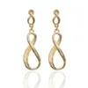 Boucles d'oreilles pendantes classiques géométriques irrégulières pour femmes, mode lettre torsadée, bijoux en forme de huit, Gadget européen élégant