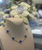 Mode luxe 4/Vierbladige Tien Bloemen Vier Gras Ketting Dames Licht V Goud Dikke Plating 18K Rose Blue Jade Medaille Hoogwaardig gevoel