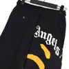 0zq8 Pantalones de joggers de palma negros para hombre Pantalones de chándal casuales sueltos con estampado de árbol de coco de diseñador