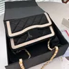 سلاسل رفرف أكياس الأزياء مصمم الكتف حقيبة العلامة التجارية 23SS TOUS CROSSBODY حقائب اليد الفاخرة عالي الجودة حقيبة نساء محفظة محفظة الهاتف المحفظة