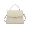 and three-dimensional portable western-style trendy small square with palm pattern cowhide tote white collar niche single shoulder crossbody bag model 542