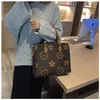 Cheap 90% off Family Women's 2023 New Old Flower Big Net Red One Shoulder Oblique Straddle Handbag Large Capacity Shopping Bag model 997