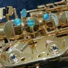 عالية الطرف ex100 E-flat Paint Gold Brass Alto Saxophone German Craft Manufacturing acnecturing مع مربع الشحن المجاني