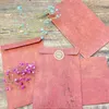 Cadeau cadeau 100pcs / lot vintage kraft papier timbre série enveloppes enveloppe antique 16 11cm en gros