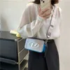 Årets populära kamera 2023 Summer New Women's Personality Letter Single Wide Shoulder Strap Crossbody Bag 60% rabatt på Outlet Online