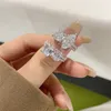 Anello di amore del progettista di gioielli di moda di lusso per donna Diamanti bling in argento sterling 100% 925 8A Cubic Zirconia Diamond Donna Sposa Anello di fidanzamento per matrimonio Confezione regalo