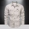 Męskie koszule zwykłe koszulka ładunkowa Mężczyźni Długie rękawowe bawełniane koszule Wysokiej jakości Camisa Militar Asshirt Marka odzieży Czarne bluzki 5xl 230901