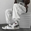 Pantaloni da uomo Bianco Uomo Hip Hop Cargo Moda Jogging Casual Streetwear Nastri multi-tasca Harem Pantaloni sportivi187E