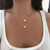 Nouveau collier Double couche pour femmes, Imitation de perle en cristal, pendentif en forme de cœur, ras de cou, cadeau pour filles, bohémien, bijoux bon marché, vente en gros, YMN001