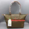 Compras de alta qualidade saco de praia carteiras designers mulher simples viagem axilas bolsa de nylon carteira shopper bolinhos impermeáveis ​​leve armazenamento dobrável