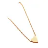 Collier avec pendentif d'amour de la mode européenne et américaine, Style INS minimaliste polyvalent pour femmes, en acier inoxydable, chaîne de cou en forme de cœur de pêche