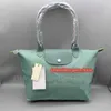 Compras de alta qualidade saco de praia carteiras designers mulher simples viagem axilas bolsa de nylon carteira shopper bolinhos impermeáveis ​​leve armazenamento dobrável