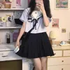 Vestidos de trabajo Traje de marinero japonés Universidad Feng Shui Camisa de manga corta hecha a mano Falda plisada para mujer Jk Uniforme Reductor de edad Conjunto de dos piezas