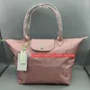 Compras de alta qualidade saco de praia carteiras designers mulher simples viagem axilas bolsa de nylon carteira shopper bolinhos impermeáveis ​​leve armazenamento dobrável