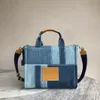 Tygväskan handväskor totes väskor designer väska kvinnor mode all-match shopper axel denim handväska 1: 1 hög kvalitet 33/26/15 cm