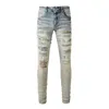 Mens Designer Jeans nödställda rippade cyklist Slim Fit Motorcykel denim för män av högsta kvalitet mode jean mans byxor häll hommes 831