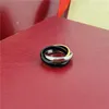 anel de três círculos anéis femininos cor preto clássico homens designer de aço de titânio para mulheres homem presentes de luxo mulher menina ouro joias de ouro não desbotam