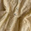 Vestido de renda de estilo de luxo leve cintura de pescoço redonda de manga longa Um vestido de bolo de borda de borda de borda elegante e elegante vestido longo