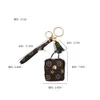 Tasarımcı Kılıf Moda Anahtarlıklar PU PU Deri Anahtar Yüzük Zincirleri Takı Kahverengi Çiçek Kolye Çantası Takılar Anahtarlar Araba Anahtarları Tutucu Moda Aksesuarları