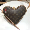 2021 Famous Fashion Love Ladies Crossbody Heart-Shaped Bag Wallet Handväska axelmynt Purse240v