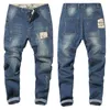 Jeans para hombres para hombre 2021 Camuflaje Costura Pantalones elásticos Pantalones de marca masculina Negro Azul Talla grande 42 44 46 48 Large193F