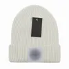 Elegante Stone Beanie designer invernale Beanie uomo donna Moda triangolo lettere design cappelli lavorati a maglia berretto di lana autunno geometrico unisex caldo cappello teschio f1