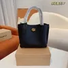 borsa popolare Lora Borsa a secchiello in pelle borsa a tracolla di grande capacità moda in ottone chiusura a torsione design con piede in metallo previene l'usura confezione regalo borsa tote bellezza