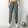 Pantaloni sportivi da donna Quick Dry Atletica Palestra Fitness con due tasche laterali Pantaloni da allenamento Pantaloni sportivi Tessuto con coulisse Corsa allentata