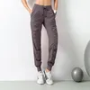 Pantaloni sportivi da donna Quick Dry Atletica Palestra Fitness con due tasche laterali Pantaloni da allenamento Pantaloni sportivi Tessuto con coulisse Corsa allentata