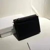 2023 Nueva cartera de diseñador Cartera de lujo de cuero de vaca de primera clase Carteras cortas para mujeres Titular de la tarjeta de crédito Bolso Zero Carteras Monedero negro para hombres