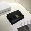 2023 Nouveau portefeuille de designer haut de gamme en cuir de vachette portefeuille de luxe femmes portefeuilles courts porte-carte de crédit sac à main zéro portefeuilles noir hommes sac à main