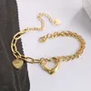 Modedesigner-Tiff-Halskette, Top-Stahl, süßer und minimalistischer Stil, T-Familienschriftzug, aushöhlen, Liebe, asymmetrisches Kettenarmband, weiblich, Titan, 18 Karat Gold