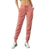 Pantaloni sportivi da donna Quick Dry Atletica Palestra Fitness con due tasche laterali Pantaloni da allenamento Pantaloni sportivi Tessuto con coulisse Corsa allentata