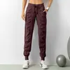 Pantaloni sportivi da donna Quick Dry Atletica Palestra Fitness con due tasche laterali Pantaloni da allenamento Pantaloni sportivi Tessuto con coulisse Corsa allentata