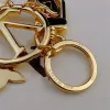 Keychain a sospensione di lusso per uomini e donne designer Carabiner Keyring Auto Borsa Keyring Decoration Letter Flow