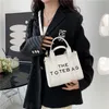 Mini tote feminino 2023 nova tendência moda bolsa júnior de alta qualidade crossbody saco code11