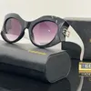 Gafas de sol de diseño de lujo para mujer Gafas de ojo de gato Diseño de marco Gafas de sol para hombre con caja Conducción Viajes Ropa de playa Gafas de sol CYD239065-6