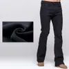 GRG Pantalones vaqueros con corte de bota de invierno para hombre, pantalones vaqueros negros elásticos gruesos y cálidos, pantalones ajustados ligeramente acampanados, Fleece1240J